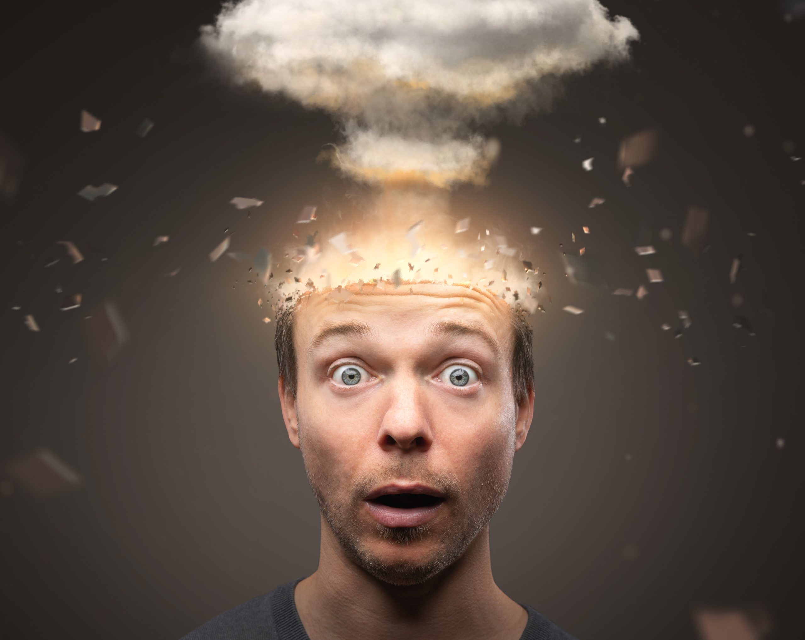 A man with exploding head and a cloud coming out of his head.