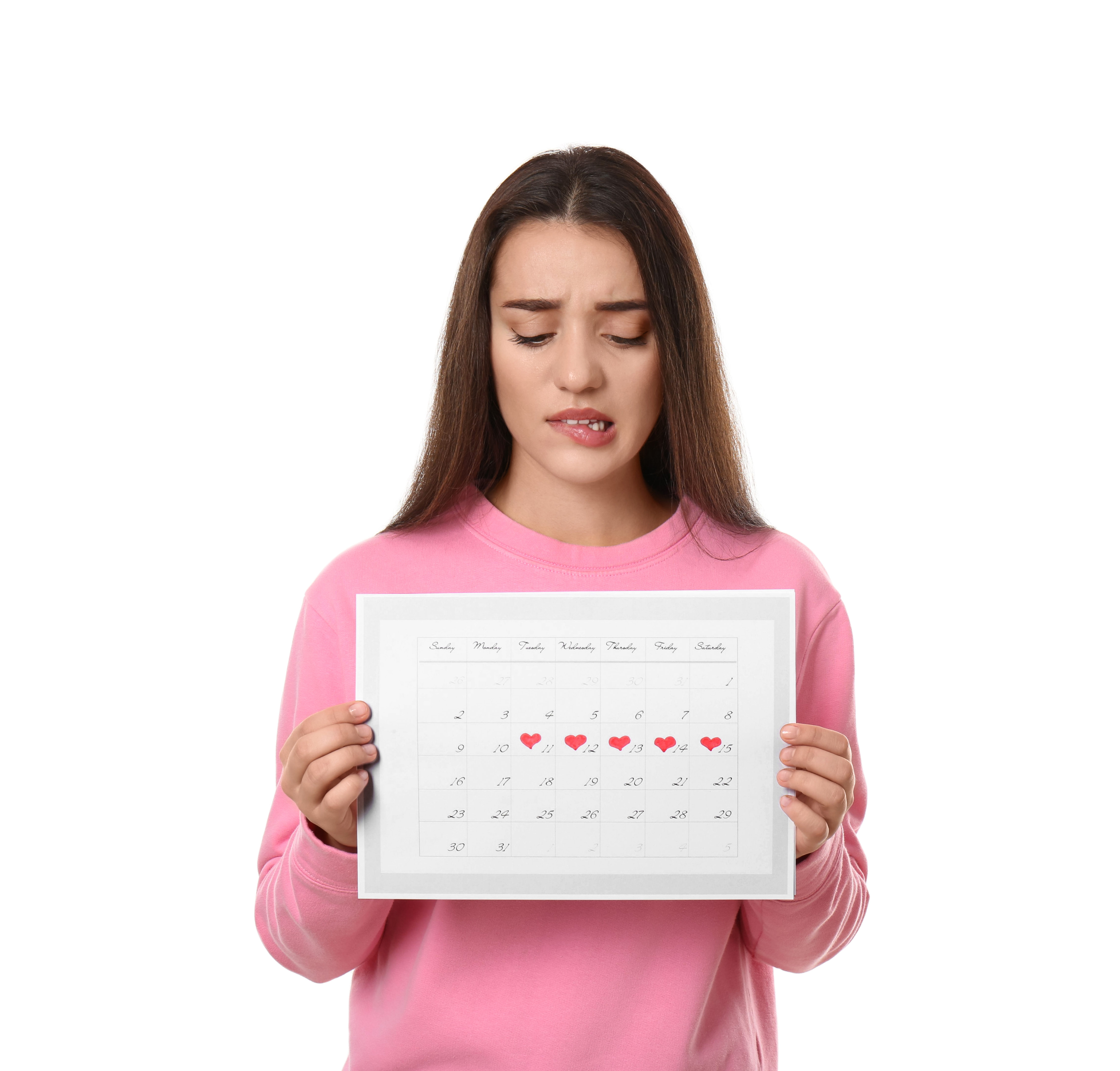 A woman holding up a calendar with hearts on it.